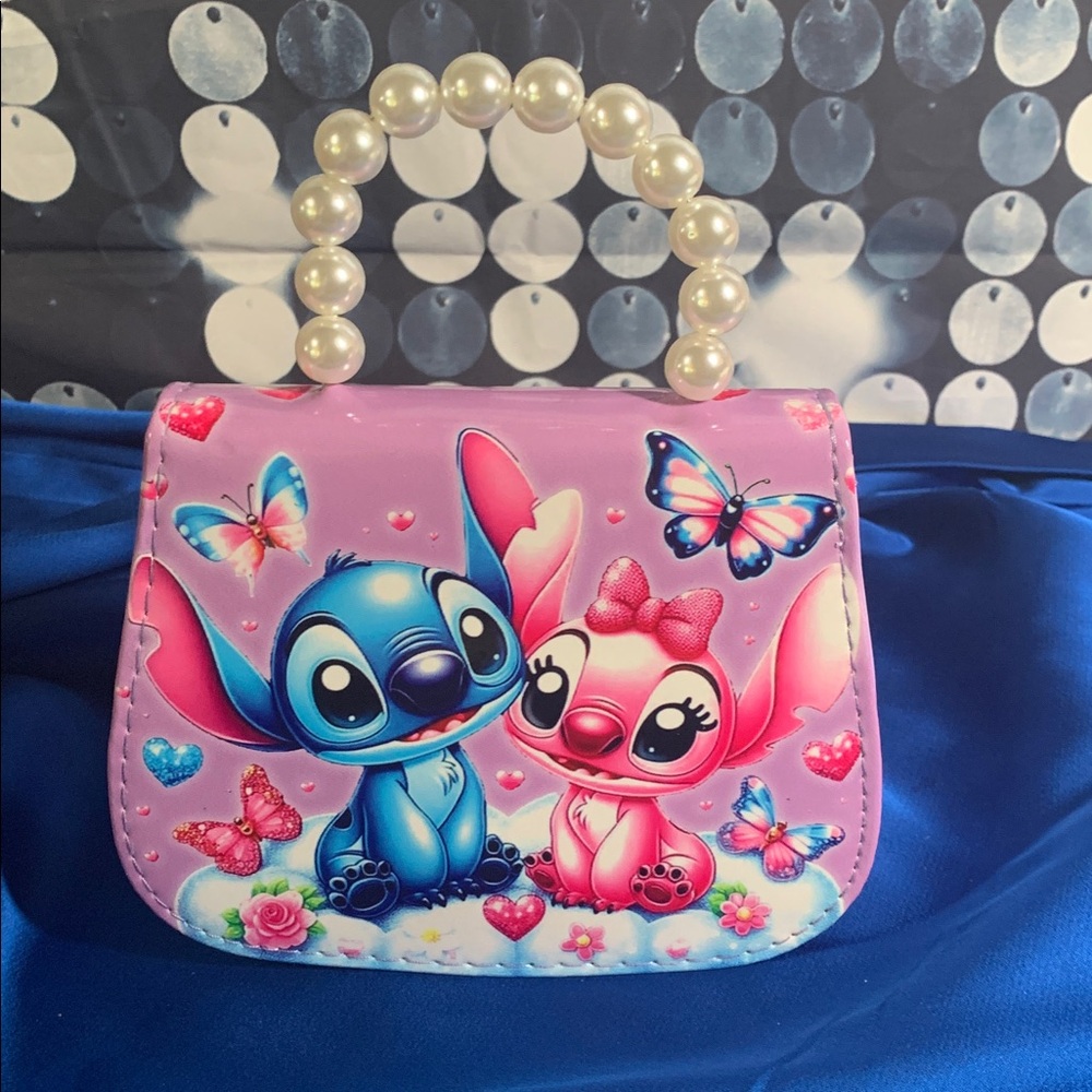 Super cute purple Stitch clutch/crossbody
